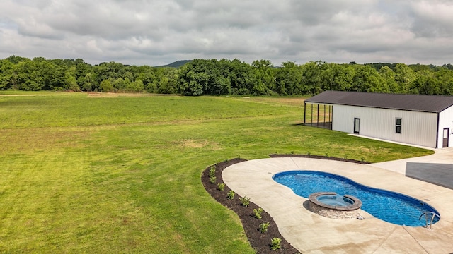 view of swimming pool with a yard and a patio area