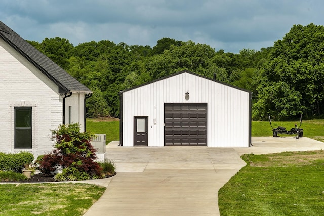 garage with a yard