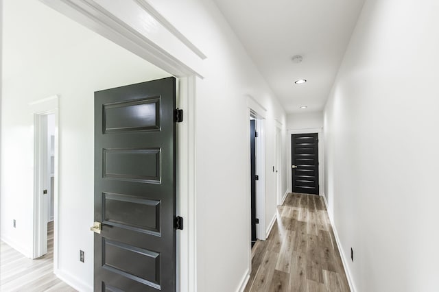 hallway featuring light hardwood / wood-style floors