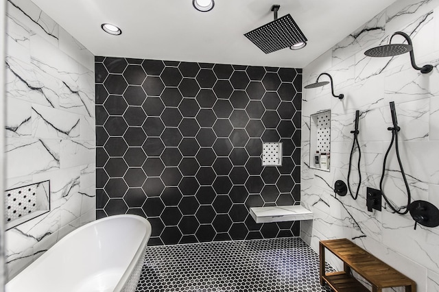 bathroom featuring tile walls and plus walk in shower