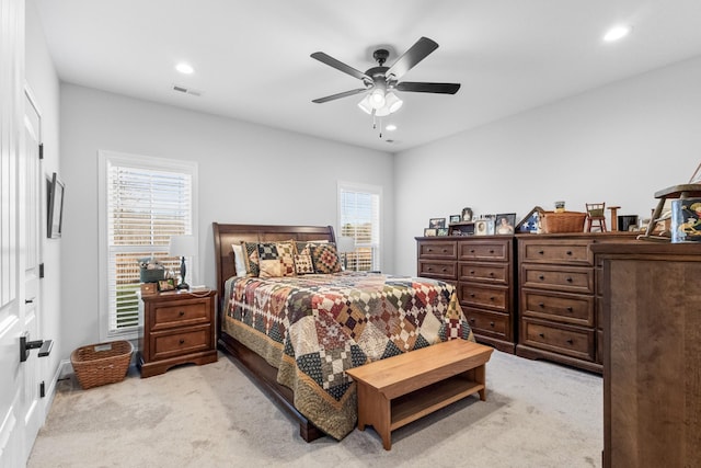 carpeted bedroom featuring ceiling fan