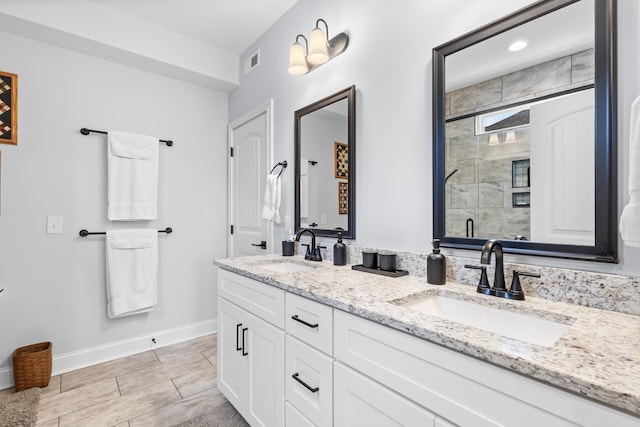 bathroom featuring vanity and walk in shower