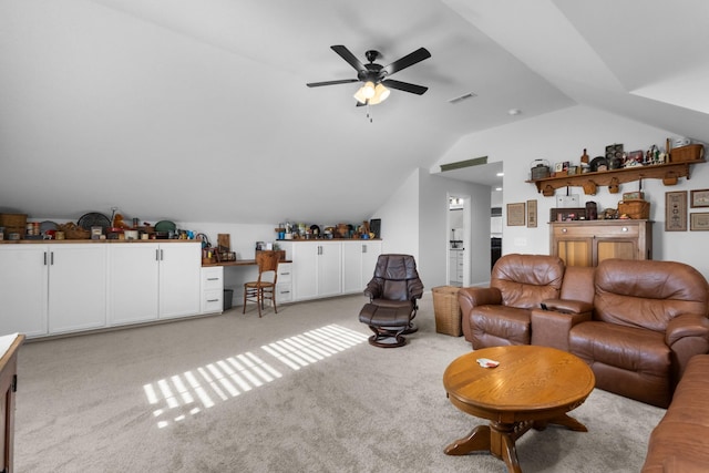 living room featuring light carpet, ceiling fan, and lofted ceiling