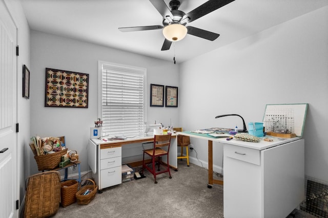 office space with light carpet and ceiling fan