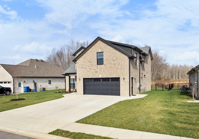 view of front facade with central AC, a garage, and a front lawn