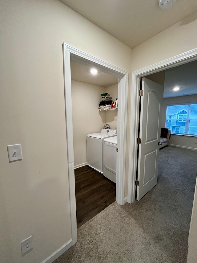 washroom with dark colored carpet and washing machine and dryer