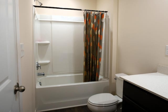 full bath with vanity, shower / bath combination with curtain, and toilet