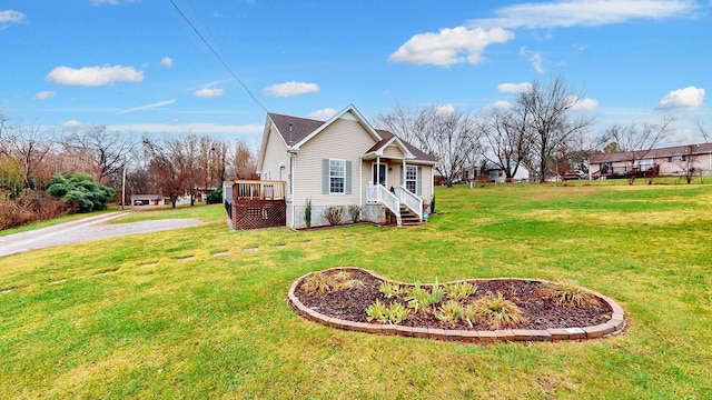 view of side of home featuring a yard