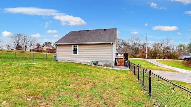 view of home's exterior with a yard