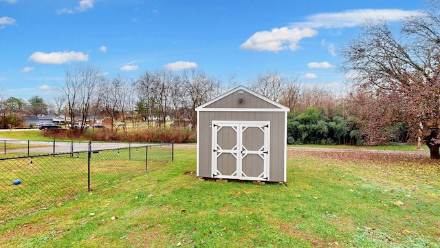 view of outdoor structure with a lawn