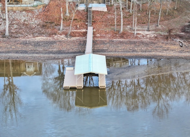 dock area with a water view