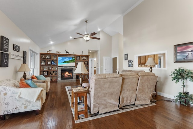 living room with ceiling fan, high vaulted ceiling, and dark hardwood / wood-style floors