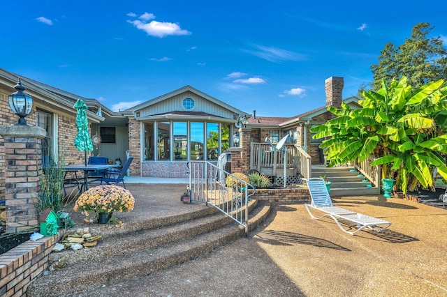 view of front of house featuring a patio