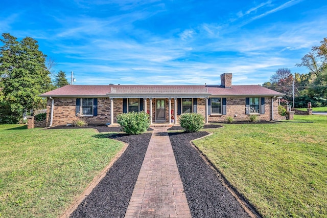 ranch-style house with a front lawn