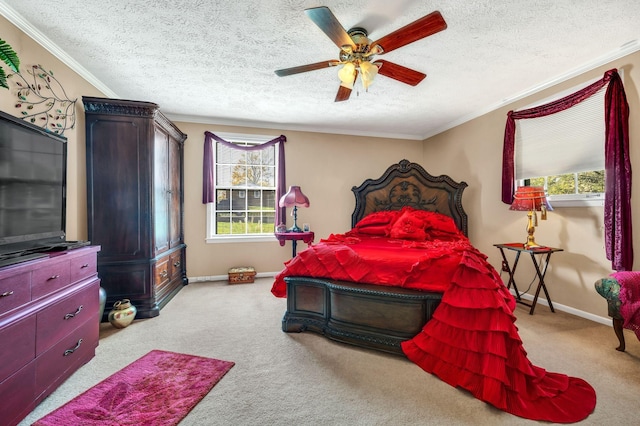 bedroom with a textured ceiling, light colored carpet, ceiling fan, and crown molding