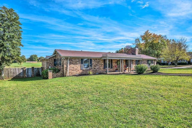 ranch-style house with a front yard