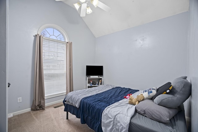 bedroom featuring ceiling fan, light carpet, and vaulted ceiling