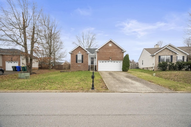 view of front of house with a garage and a front lawn