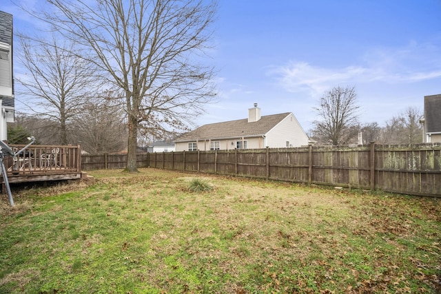 view of yard featuring a deck