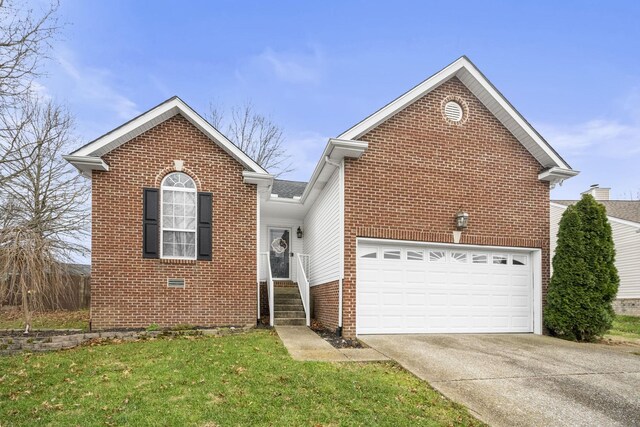 view of property with a front yard and a garage