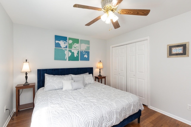 bedroom featuring ceiling fan, wood-type flooring, and a closet