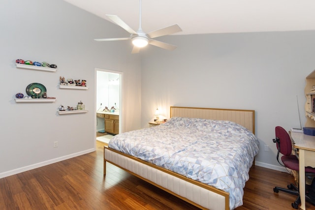 bedroom featuring ceiling fan, vaulted ceiling, wood-type flooring, and ensuite bath