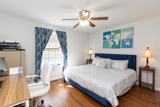 bedroom with hardwood / wood-style floors and ceiling fan