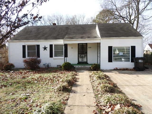 ranch-style house featuring covered porch