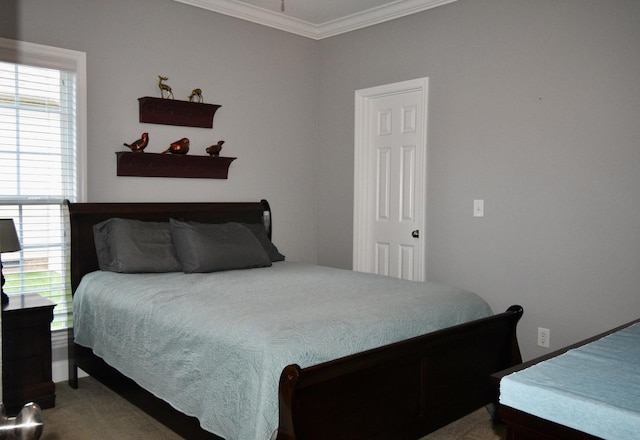 bedroom featuring crown molding