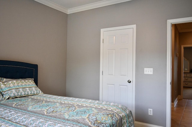 tiled bedroom with crown molding