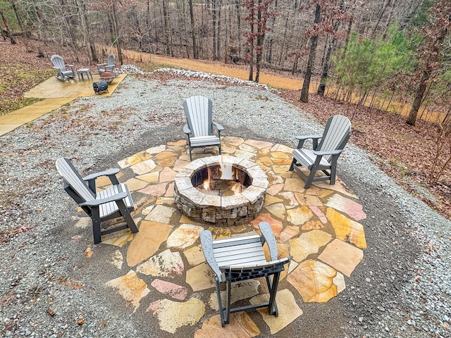 view of patio / terrace featuring an outdoor fire pit