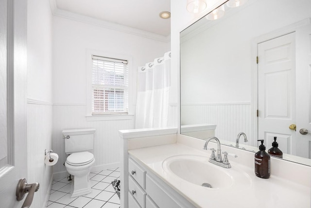 bathroom with crown molding, tile patterned flooring, vanity, and toilet