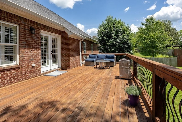 deck featuring outdoor lounge area