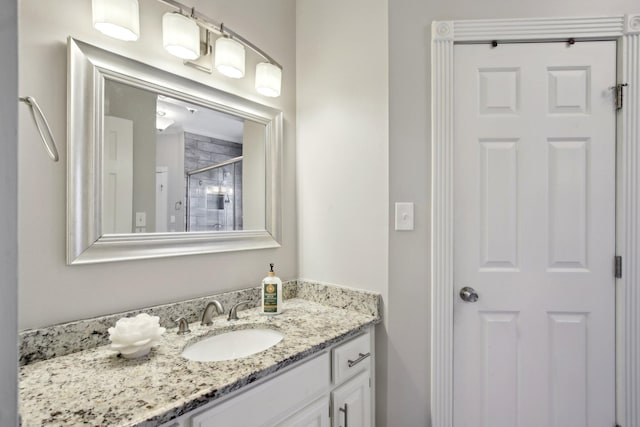 bathroom with vanity and walk in shower