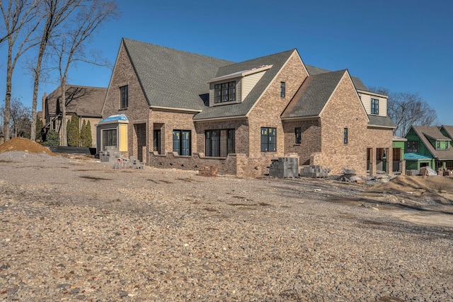 view of front of house with central AC unit