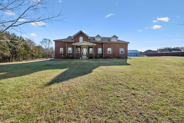 view of front of home featuring a front yard