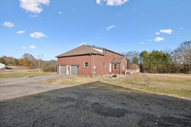 view of home's exterior with a garage