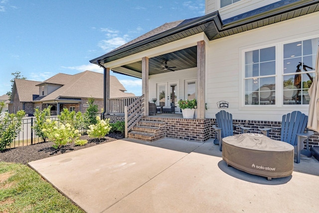 view of patio / terrace featuring french doors and ceiling fan