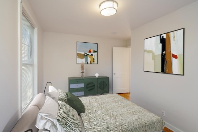 bedroom featuring hardwood / wood-style floors