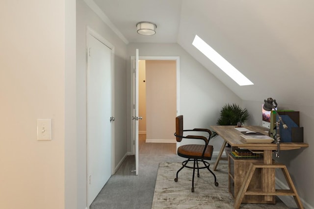 home office featuring lofted ceiling with skylight