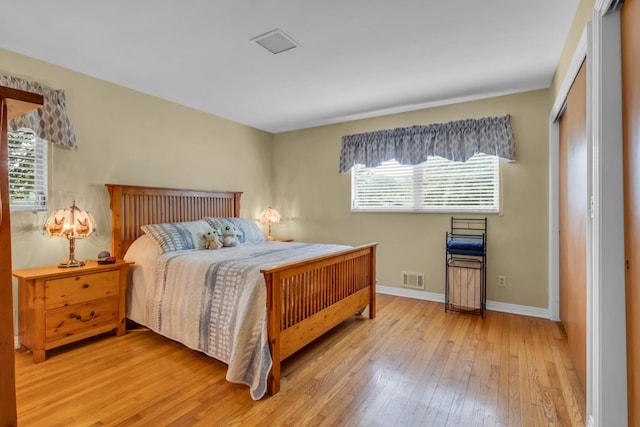 bedroom with light hardwood / wood-style flooring