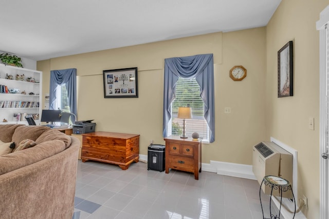 living room with light tile patterned floors