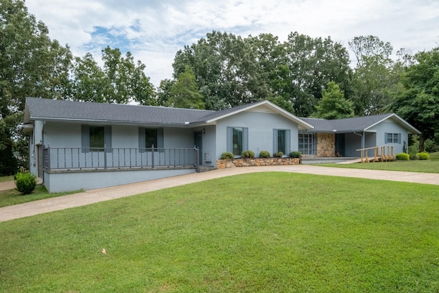 ranch-style house featuring a front lawn