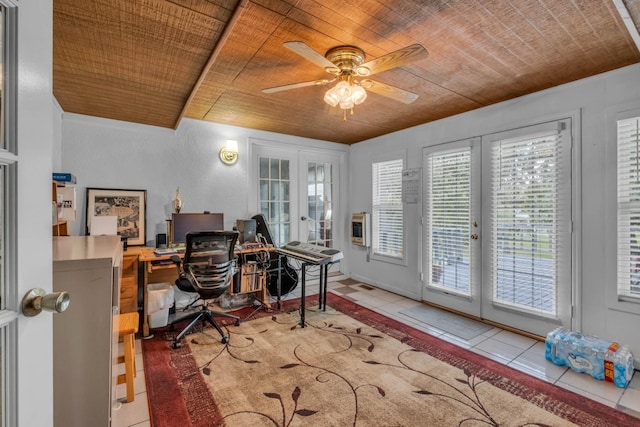 home office with ceiling fan, light tile patterned flooring, and french doors