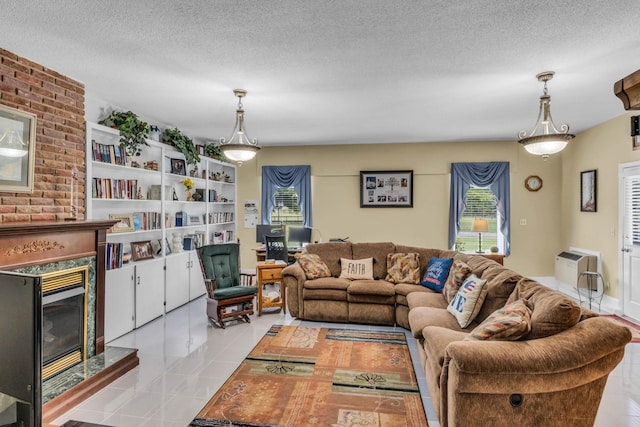 tiled living room with a fireplace and a textured ceiling