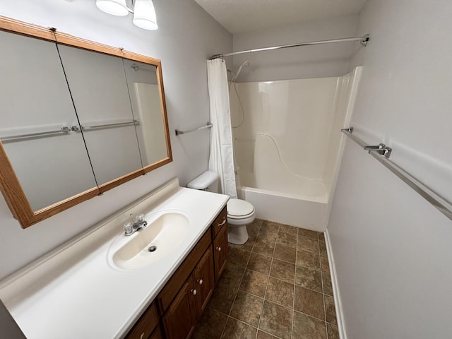 full bathroom with vanity, shower / bath combination with curtain, and toilet