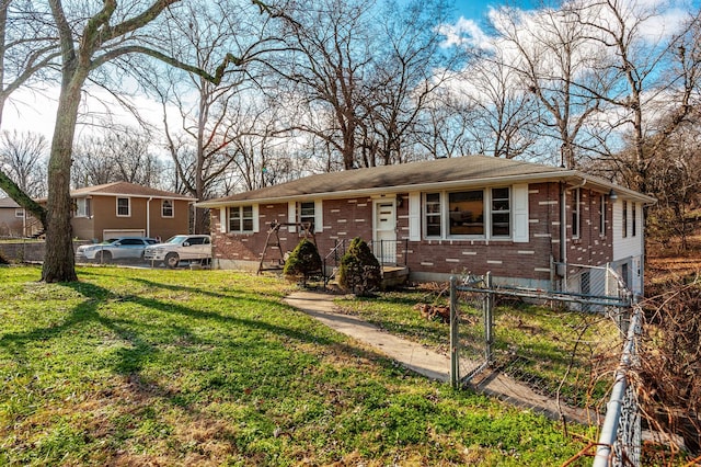 single story home with a front yard