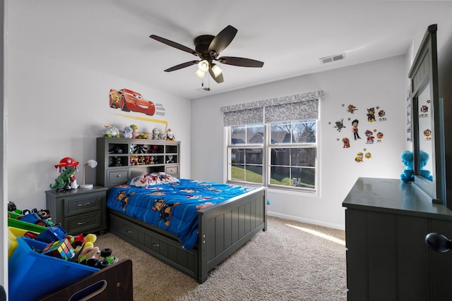 carpeted bedroom with ceiling fan