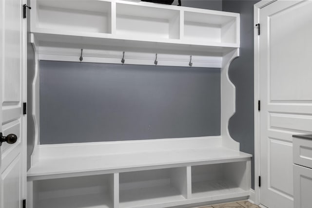 mudroom featuring light tile patterned floors