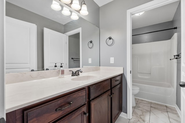 full bathroom featuring vanity, toilet, and washtub / shower combination